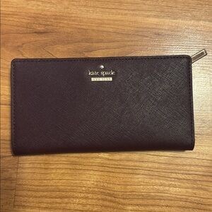 Kate Spade Elegant plum Clutch
